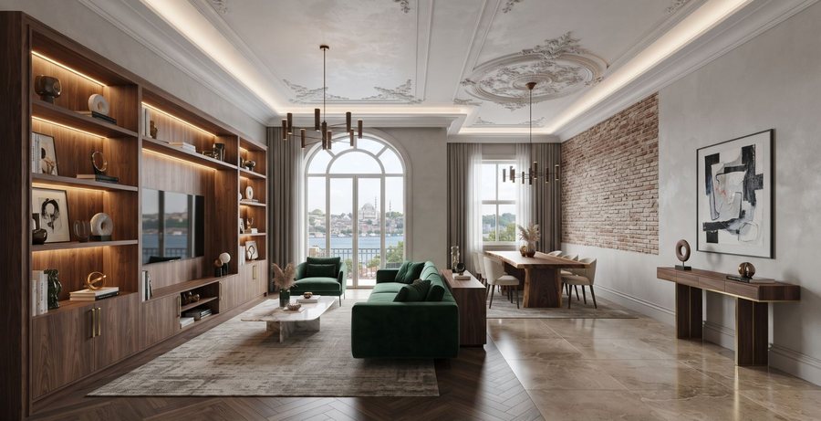Kitaplık duvarı ve oturma grubuyla düzenlenmiş salon